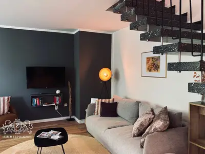 Wohnzimmer mit Schlafsofa