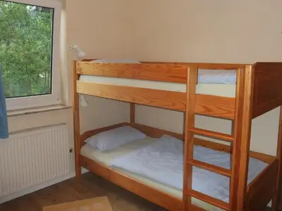 Schlafzimmer mit Etagenbett Beispiel FeWo F