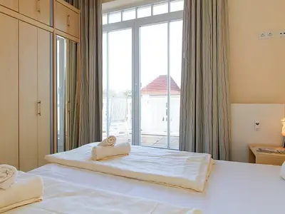 Schlafzimmer mit Doppelbett Schlafzimmer mit Doppelbett
