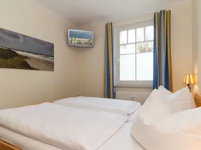 Schlafzimmer mit Doppelbett