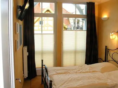 Schlafzimmer mit Doppelbett