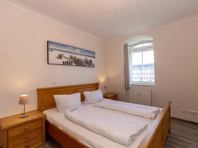 Schlafzimmer mit Doppelbett