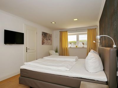 Schlafzimmer mit TV