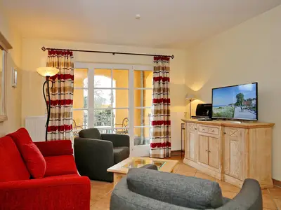 Wohnbereich mit Sitzecke und TV