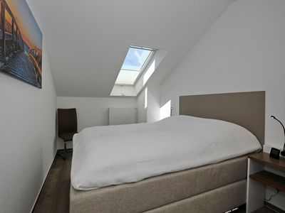 Schlafzimmer mit Doppelbett