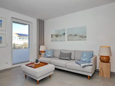 Wohnzimmer mit Zugang zur Terrasse