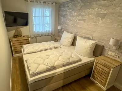 Schlafzimmer mit Doppelbett