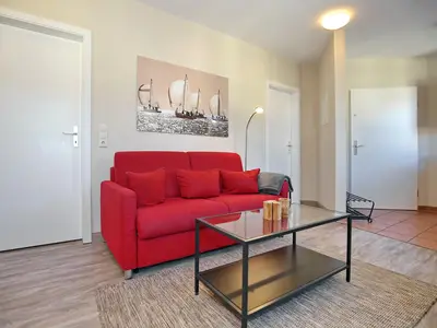 Wohnzimmer mit Schlafsofa