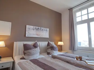 erstes Schlafzimmer mit Doppelbett