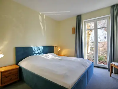 Schlafzimmer mit Doppelbett