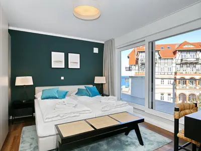 Schlafzimmer mit einem Boxspringbett