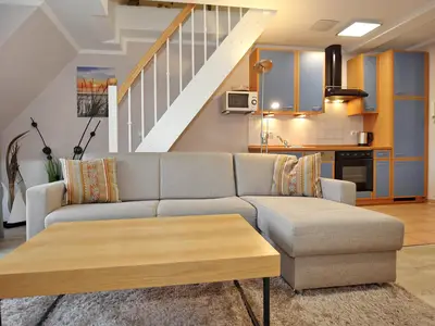 Wohnzimmer mit Schlafsofa