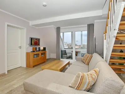 Sofa mit Zugang zum Balkon