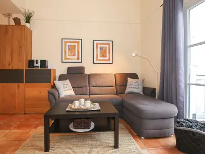 Wohnzimmer mit Schlafsofa