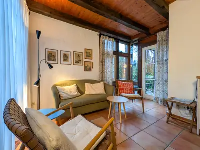 Wohnzimmer mit Zugang zur Terrasse