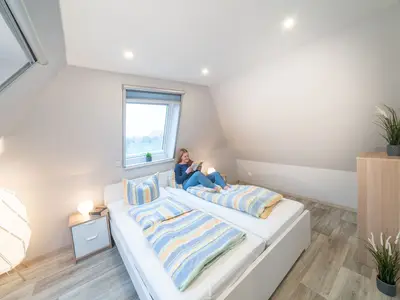 Schlafzimmer mit Doppelbett