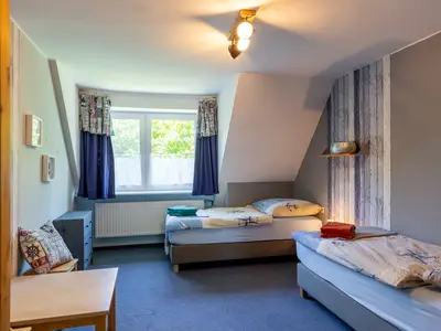 Kinderzimmer mit 2 Einzel boxspringbetten