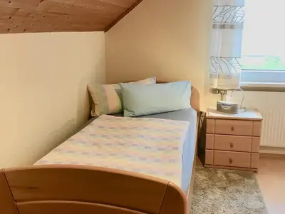 Ferienwohnung Wick - Einzelschlafzimmer