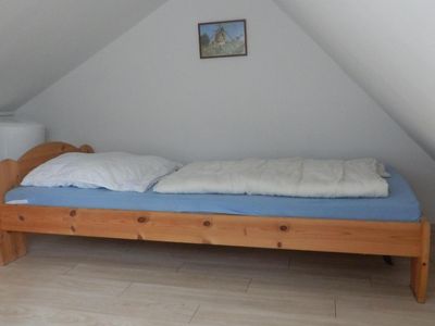 Einzelbett im Spitzboden