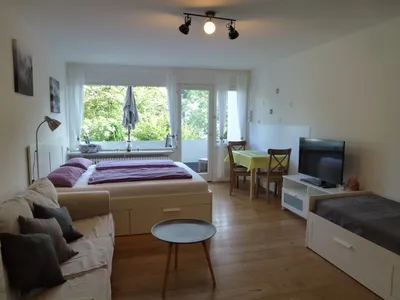 Ferienwohnung Leo Wohn-, Schlafzimmer
