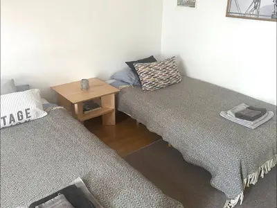 Wohnzimmer Einzelbetten statt Sofa