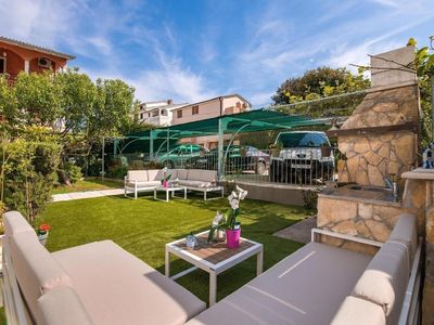 Ferienwohnungen Lovric mit Wellness und Pool / Gemeinsame Terrasse