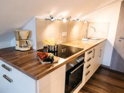 Fewo Burgunder: Küche im Wohnraum