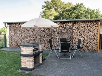 Terrasse. Terrasse mit Grillbar/Kamin Außenbereich