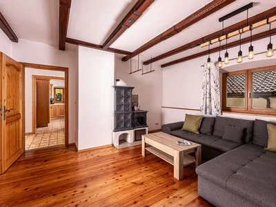 Wohnzimmer mit Holzofen Fewo Drischlag 1