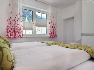 Schlafzimmer im Appartement Alpenrose