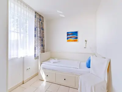 Ferienwohnung "Garten"- Bett