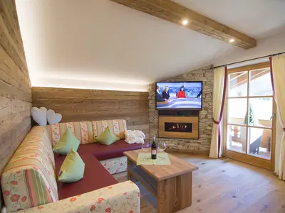 Der Wohnbereich unserer Kaiserwinkl Suite ist an Gemütlichkeit kaum mehr zu überbieten.