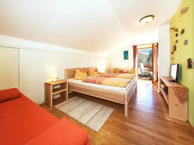 Schlafzimmer mit Balkonzugang