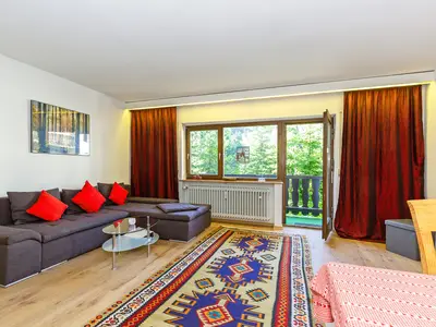 Wohnbereich mit Couchgarnitur = Couchbett