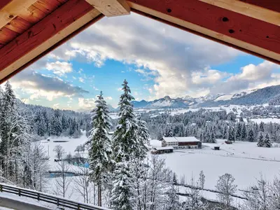 designchaelts gipfelhütte Winter Blick Wohnzimmer