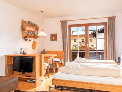 Wohn- und Schlafzimmer mit Balkon