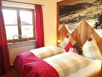 Ferienwohnung "Geigelstein": romantischer Schlafraum und kuscheligen Doppelbett...
