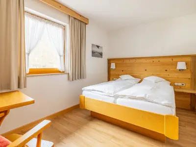 Zahmer Kaiser - zweites Schlafzimmer, Betten in Komforthöhe, Flachbildschirm-TV und eingene DU/WC