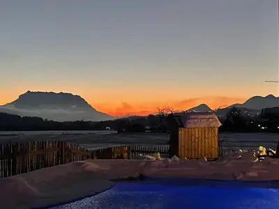 activechalets Sonnenuntergang Zahmer Kaiser naturpool