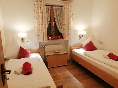 Schlafzimmer mit trennbaren Betten