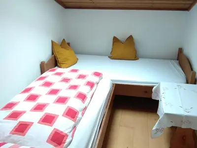 Schlafzimmer Ferienwohnung Kampenwand