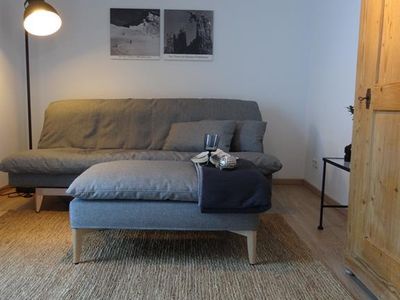 Wohnzimmer mit Schlafsofa