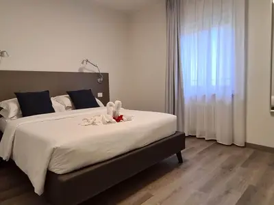 Appartamento La Rocca camera da letto