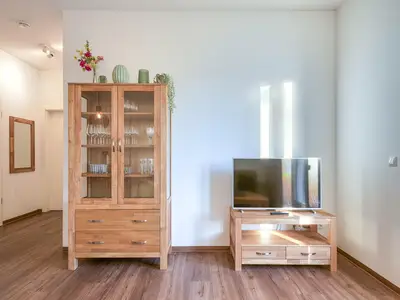 Ferienwohnung SeeBrise Röbel Wohnzimmer mit TV