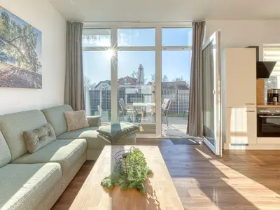 Ferienwohnung SeeNest Röbel Wohnzimmer mit Terrasse