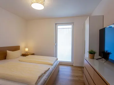 Ferienwohnung Merlin Nest Röbel/Müritz Schlafzimmer mit Doppelbett