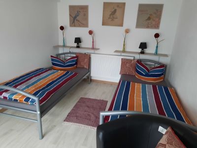 Schlafzimmer 1 mit zwei Einzelbetten