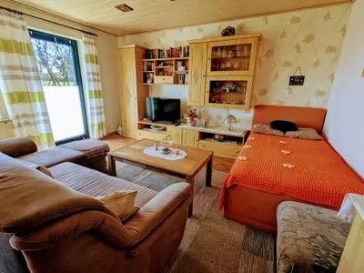 Wohnzimmer mit Zusatzbett