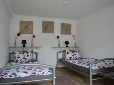 Schlafzimmer 1 mit zwei Einzelbetten