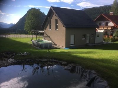 Haus mit Teich